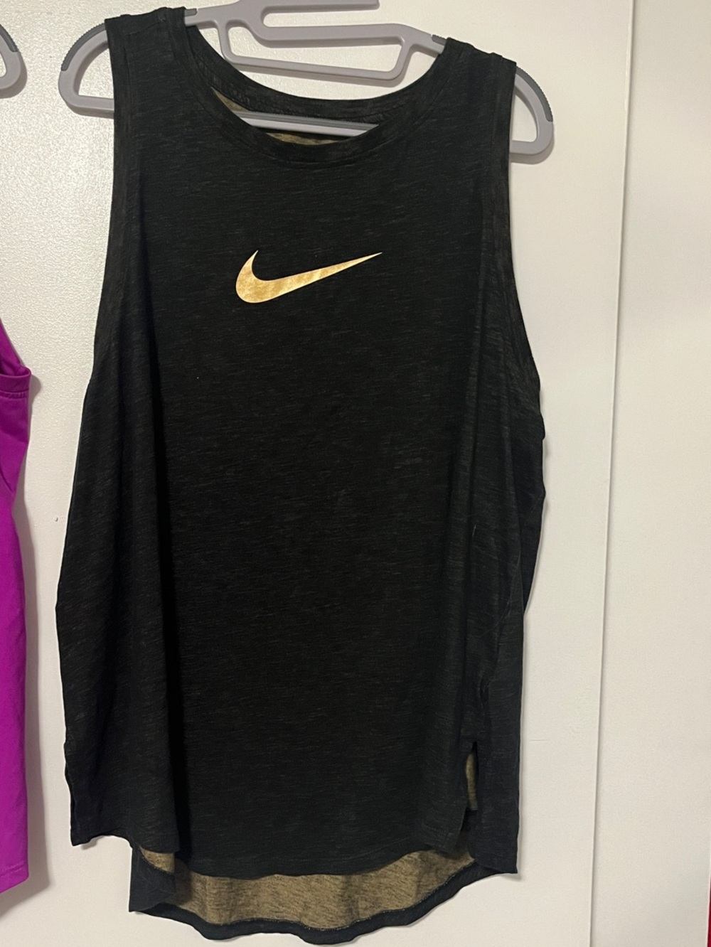 Nike Women’s Black Athletic Tank with gold Swoosh 1X
